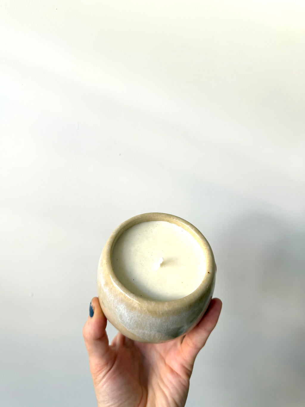 Eucalyptus soy wax candle in a ceramic cup