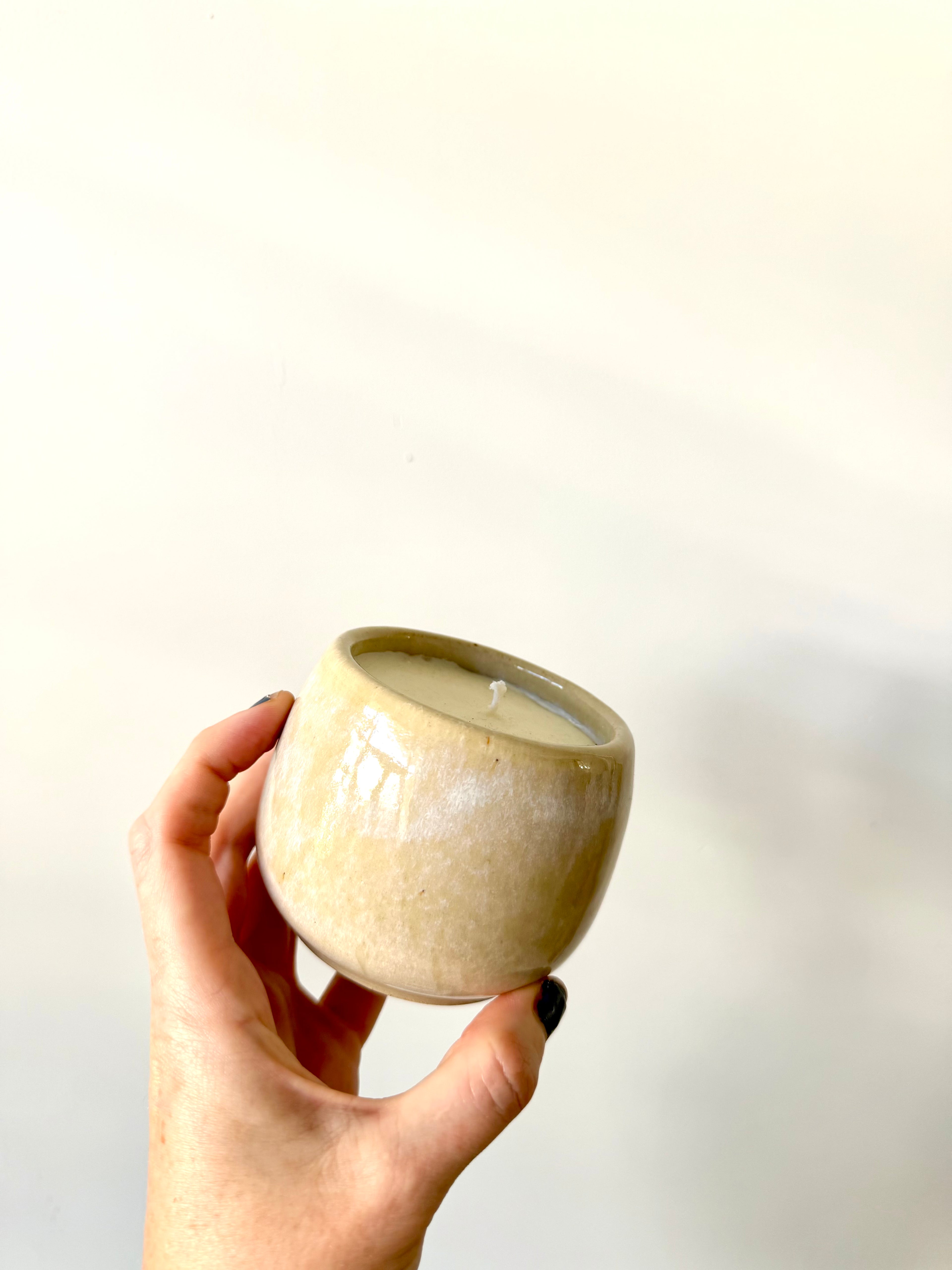 Eucalyptus soy wax candle in a ceramic cup