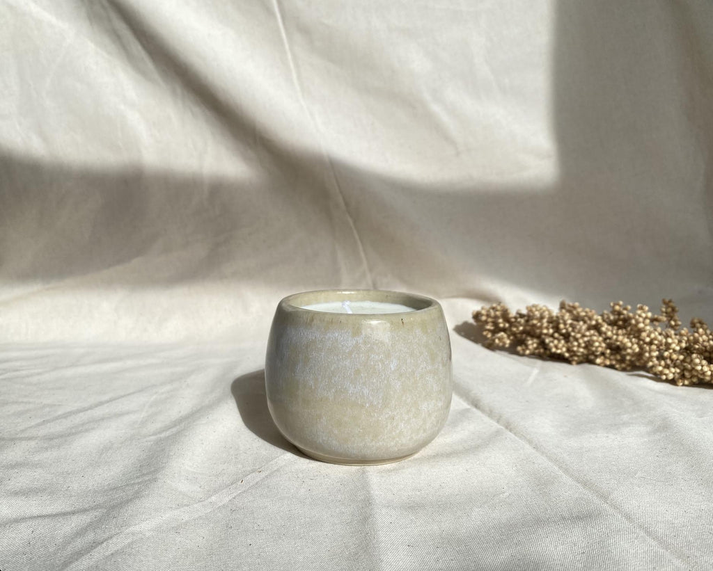 Eucalyptus soy wax candle in a ceramic cup