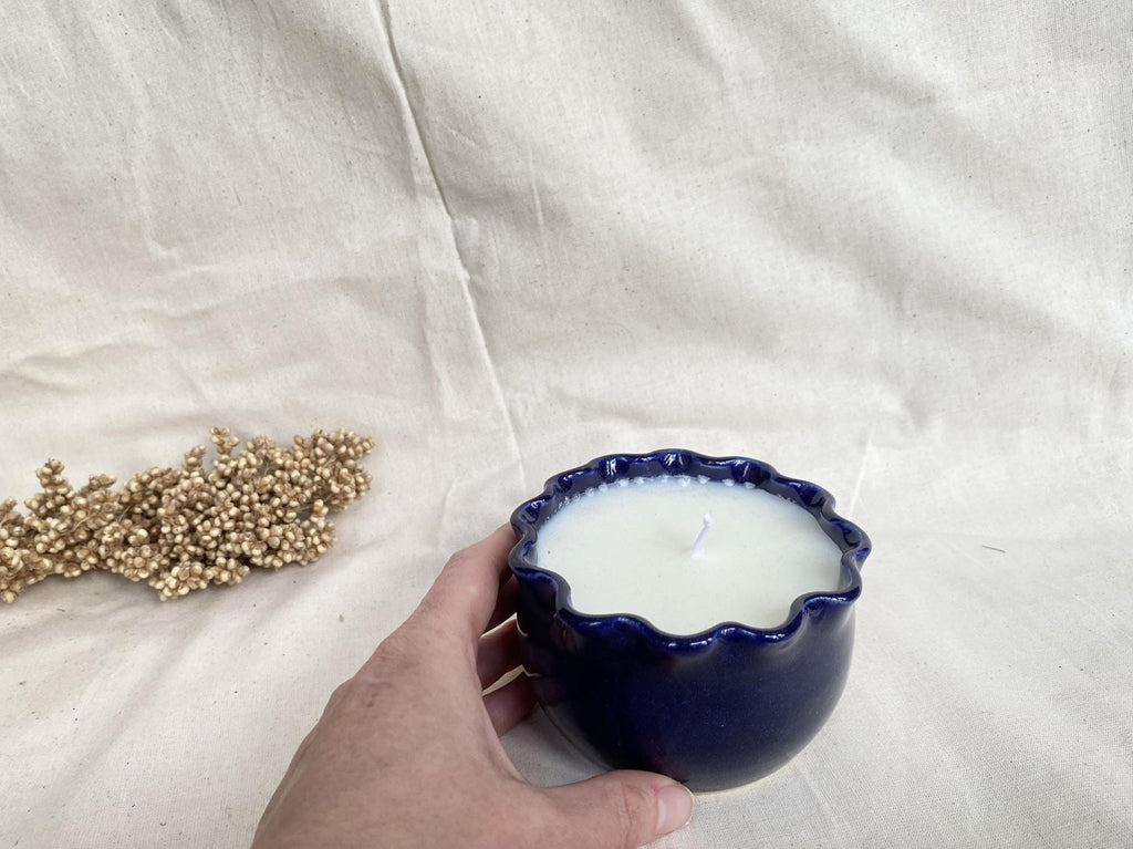 Soy wax candle in a handmade ceramic cup