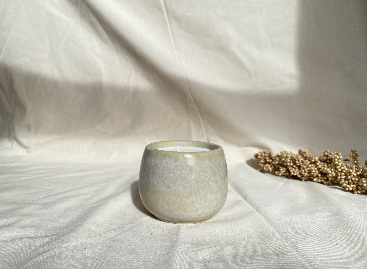 Eucalyptus soy wax candle in a ceramic cup