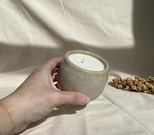 Eucalyptus soy wax candle in a ceramic cup