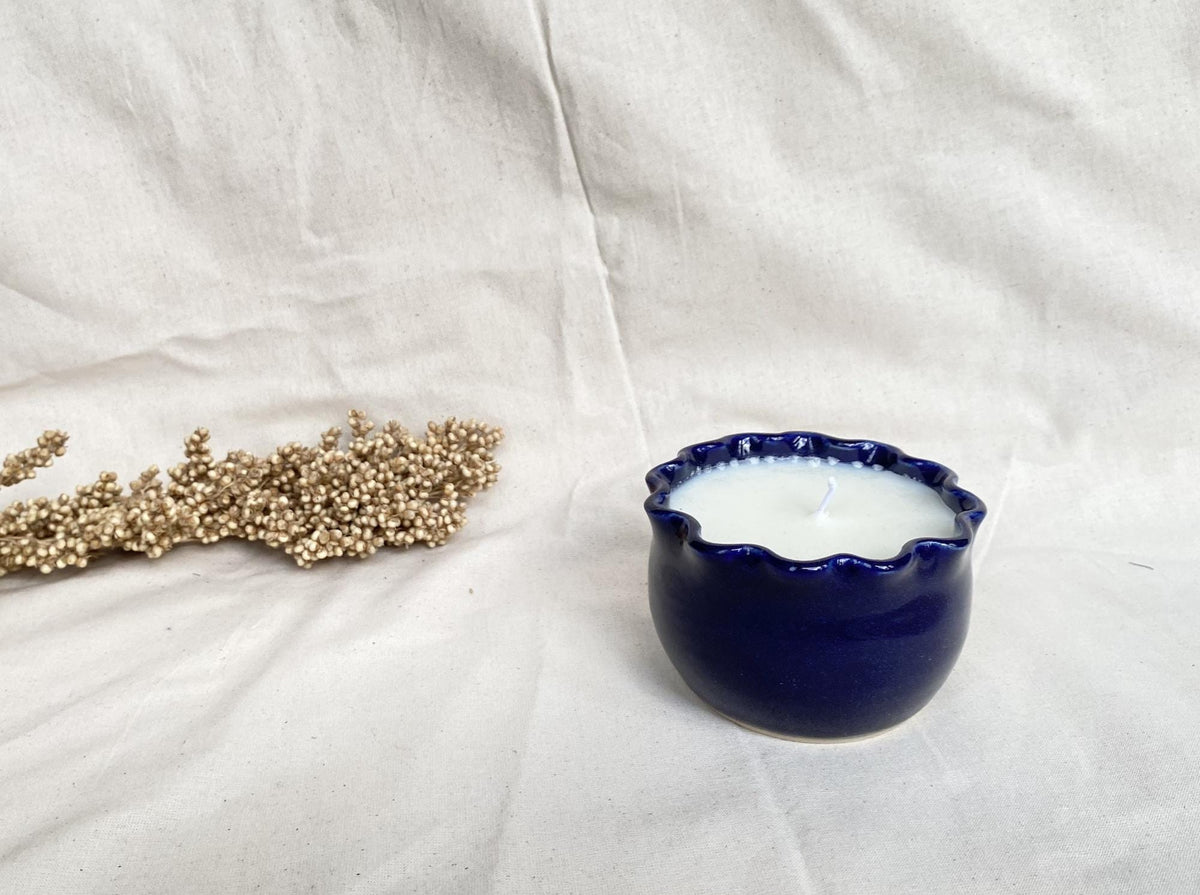 Soy wax candle in a handmade ceramic cup